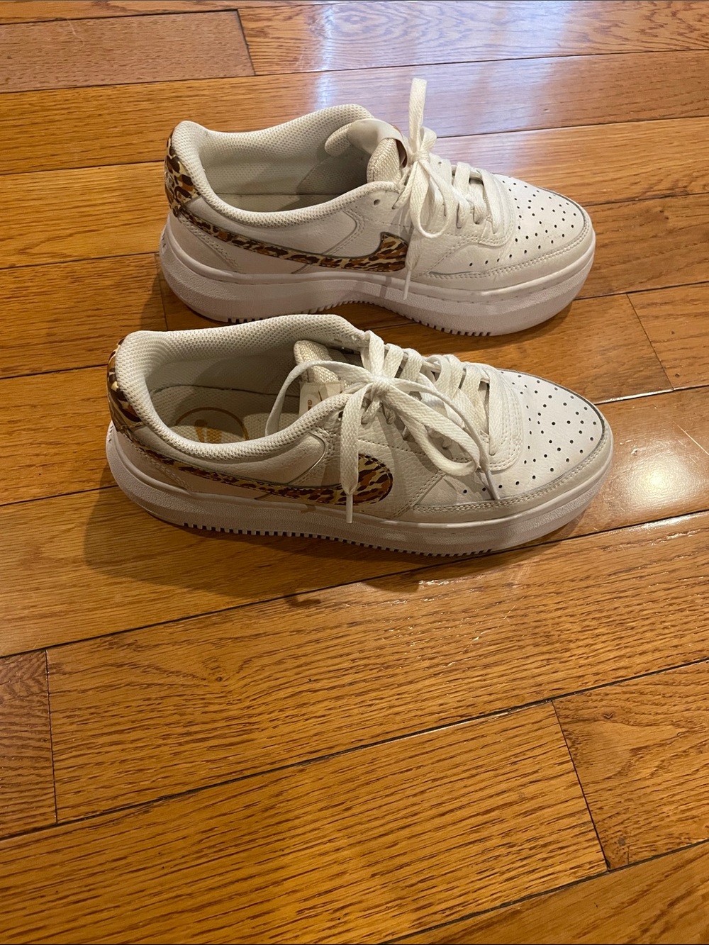 Nike Womens White Sneakers with Leopard Swoosh. Excellent condition